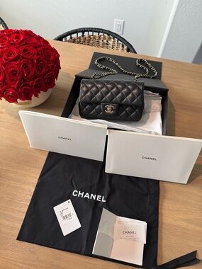 CHANEL Quilted Mini Flap Bag in Black with Gold Hardware